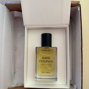 Uncommon James Hard Feelings Perfume - Elegant Gold Hue